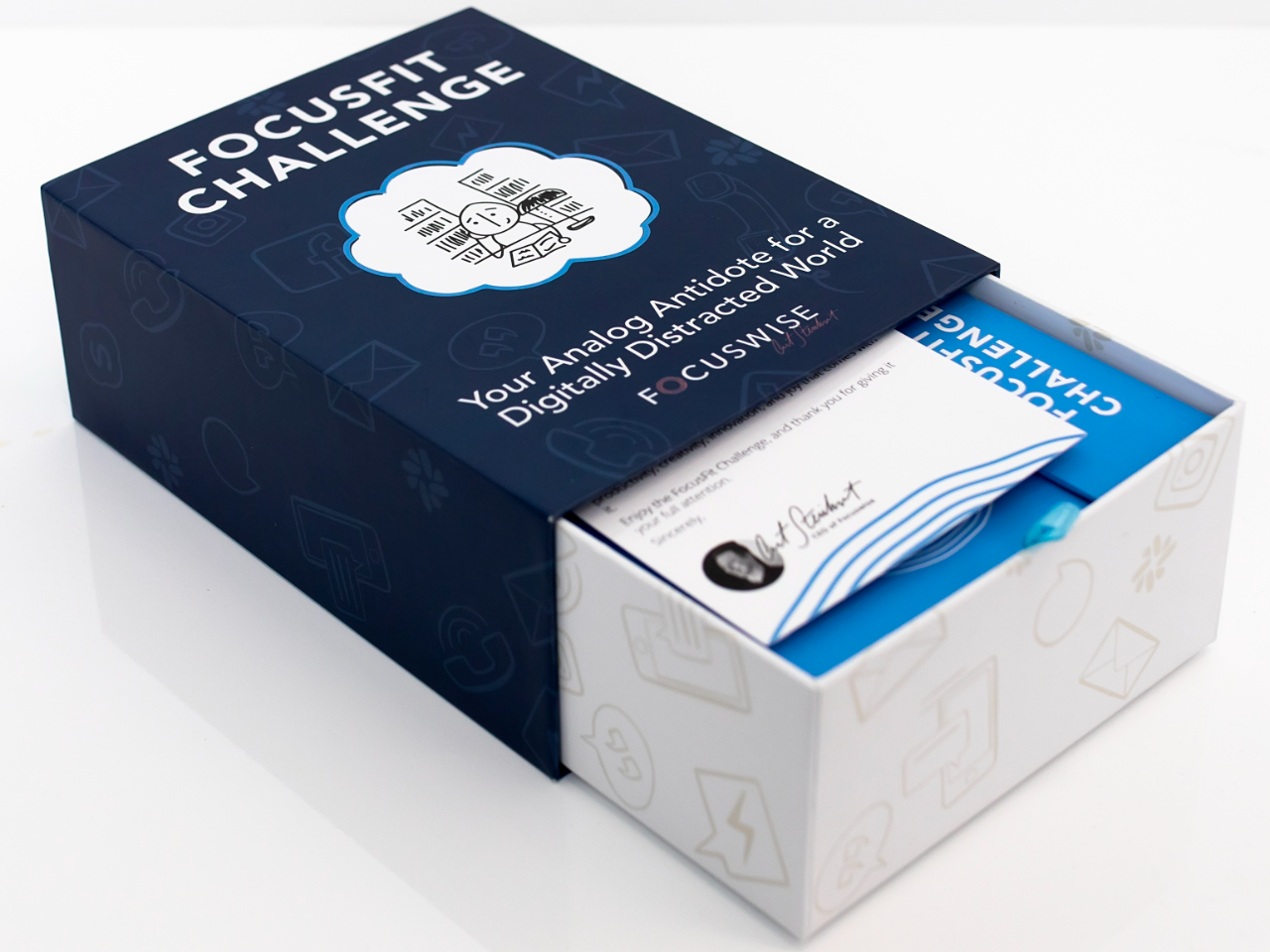 The FocusFit Challenge box open, with the welcome letter tucked inside